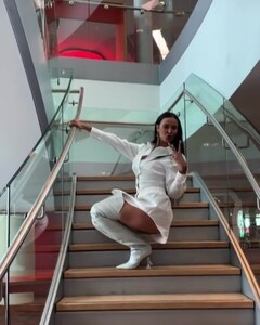 maya-jama-in-mini-dress-and-knee-high-boots-london-05-20-2021-5.jpg