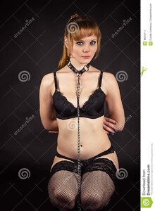 woman-sitting-slave-collar-attractive-48066711.jpg