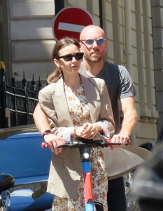 lily-collins-and-charlie-mcdowell-using-an-electric-sharing-scooter-in-paris-07-02-2022-1.jpg