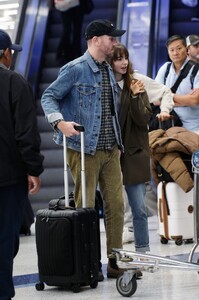 lily-collins-and-charlie-mcdowell-at-lax-airport-in-los-angeles-10-27-2022-1.jpg