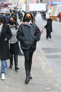zoe-saldana-in-a-black-varsity-jacket-and-a-colorful-scarf-new-york-03-01-2022-3.jpg