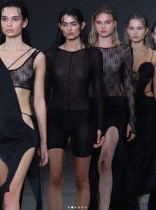 Taneisha Flowers with ST titties on runway-.jpg