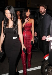 Kim-Kardashian---In-a-red-ensemble-at-the-Dolce-Gabbana-party---Fashion-Week-in-Milan-10.jpg