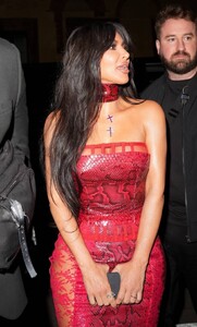 Kim-Kardashian---In-a-red-ensemble-at-the-Dolce-Gabbana-party---Fashion-Week-in-Milan-11.jpg