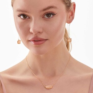 peach_druzy_freddie_threader_earrings_accessories_01_638bdad7-b25e-4c28-b144-54aff316cfb0.thumb.jpg.b7682fecef54b6a4dbdac30ae2f2746e.jpg