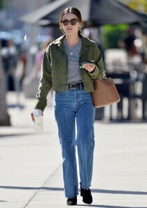 lucy-hale-sports-a-green-denim-jacket-and-blue-jeans-04-06-2023-3.jpg