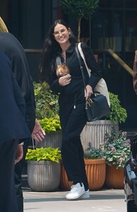 demi-moore-out-with-her-dog-in-new-york-05-22-2023-2.jpg