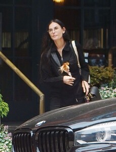 demi-moore-out-with-her-dog-in-new-york-05-22-2023-3.jpg