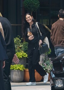 demi-moore-out-with-her-dog-in-new-york-05-22-2023-5.jpg