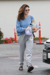 lucy-hale-in-a-blue-sweater-and-gray-sweatpants-hollywood-05-24-2023-0.jpg