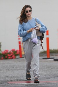 lucy-hale-in-a-blue-sweater-and-gray-sweatpants-hollywood-05-24-2023-3.jpg