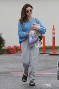 lucy-hale-in-a-blue-sweater-and-gray-sweatpants-hollywood-05-24-2023-6.jpg