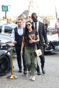 demi-moore-out-with-her-dog-in-paris-06-24-2023-5.jpg