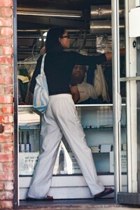 laura-harrier-picking-up-some-llaundry-at-a-dry-cleaners-in-los-feliz-06-03-2023-0.jpg