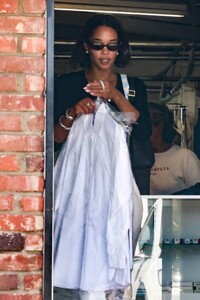 laura-harrier-picking-up-some-llaundry-at-a-dry-cleaners-in-los-feliz-06-03-2023-6.jpg