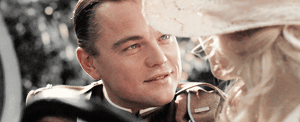 gatsbylookingatdaisy02.thumb.gif.f31e29e837a75f42c261864e9daac5cb.gif