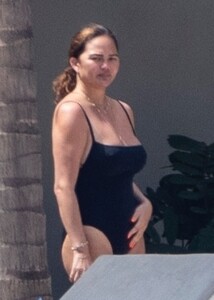 chrissy-teigen-in-swimsuit-a-a-pool-in-puerto-vallarta-08-07-2023-5.jpg