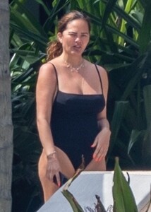 chrissy-teigen-in-swimsuit-a-a-pool-in-puerto-vallarta-08-07-2023-6.jpg