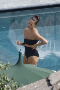 chrissy-teigen-in-swimsuit-at-a-swimming-pool-in-lake-como-09-14-2023-1.jpg