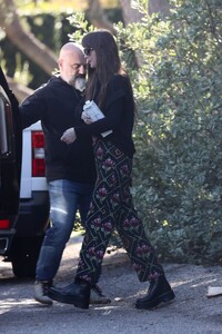 dakota-johnson-leaves-a-friends-house-in-malibu-12-16-2023-2.jpg