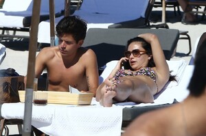 camila-mendes-on-the-beach-in-miami-02-03-2024-4.jpg