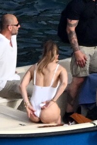 Jennifer-Lopez---Spotted-in-white-swimsuit-on-boat-in-Italy-02.jpg