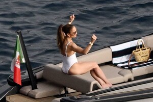 Jennifer-Lopez---Spotted-in-white-swimsuit-on-boat-in-Italy-05.jpg