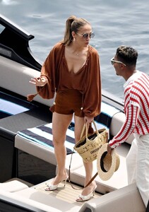 Jennifer-Lopez---Spotted-in-white-swimsuit-on-boat-in-Italy-11.jpg