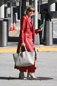 anna-wintour-wearing-a-maxi-red-leather-coat-and-snakeskin-boots-new-york-10-10-2022-3.jpg