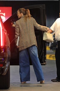 jennifer-lopez-in-a-plaid-blazer-and-wide-jeans-arriving-to-her-office-06-05-2024-1.jpg