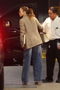 jennifer-lopez-in-a-plaid-blazer-and-wide-jeans-arriving-to-her-office-06-05-2024-5.jpg