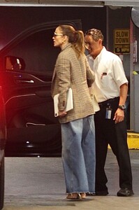 jennifer-lopez-in-a-plaid-blazer-and-wide-jeans-arriving-to-her-office-06-05-2024-6.jpg