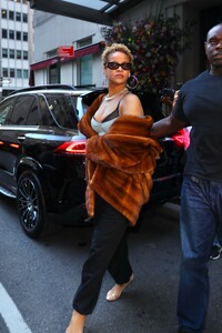 rihanna-dazzles-in-nyc-with-chic-curly-hair-and-bold-fashion-statement-1.jpg