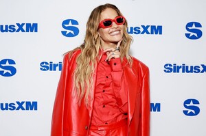 rita-ora-s-red-hot-radio-look-a-masterclass-in-monochrome-accessorizing-0.jpg