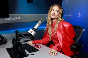 rita-ora-s-red-hot-radio-look-a-masterclass-in-monochrome-accessorizing-1.jpg