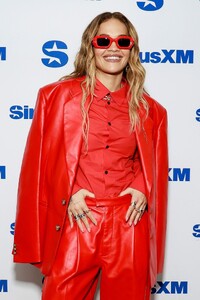 rita-ora-s-red-hot-radio-look-a-masterclass-in-monochrome-accessorizing-7.jpg