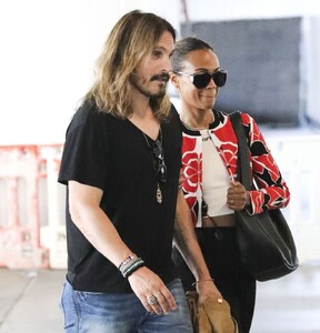 zoe-saldana-with-her-husband-lax-in-la-07-29-2024-1.jpg