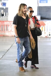 zoe-saldana-with-her-husband-lax-in-la-07-29-2024-3.jpg