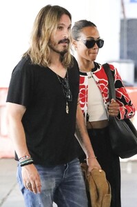 zoe-saldana-with-her-husband-lax-in-la-07-29-2024-4.jpg