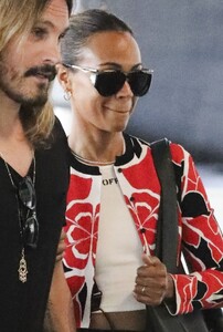 zoe-saldana-with-her-husband-lax-in-la-07-29-2024-5.jpg