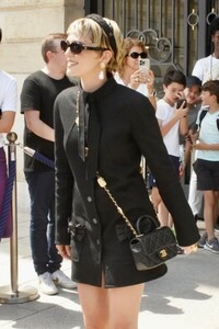 zoey-deutch-posing-for-the-cameras-before-another-fashion-event-in-paris-06-25-2024-0.jpg