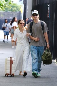 millie-bobby-brown-s-bridal-inspired-travel-chic-elevating-airport-style-8.jpg
