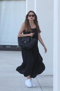sofia-vergara-in-a-chic-black-dress-white-sneakers-and-a-stylish-black-chanel-handbag-in-beverly-hills-08-02-2024-1.jpg