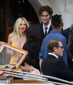 sienna-miller-and-oli-green-at-the-wedding-of-georgia-irwin-and-david-winter-at-la-certosa-island-05-25-2024-6.jpg