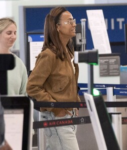 zoe-saldana-spotted-departing-toronto-09-10-2024-1.jpg