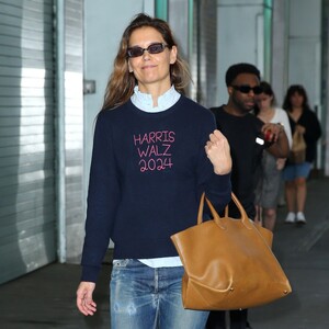 katie-holmes-wears-a-harris-walz-2024-sweater-out-in-new-york-10-30-2024-4.jpg