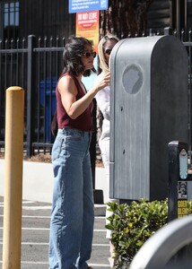 lucy-hale-stuns-in-casual-chic-maroon-crop-top-wide-leg-jeans-in-hollywood-10-08-2024-2.jpg