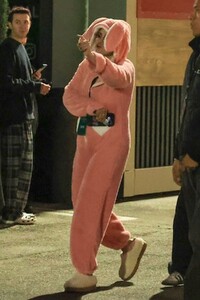 selena-gomez-in-a-pink-bunny-onesie-arrives-at-sabrina-carpenter-s-short-n-sweet-concert-at-kia-forum-in-inglewood-11-17-2024-5.jpg
