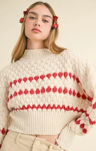 shop-at-grace-classicacres-sweater-cream-red-front_1300x2043.thumb.webp.7a94e1d2cf147d520a0fea366c023cd2.webp