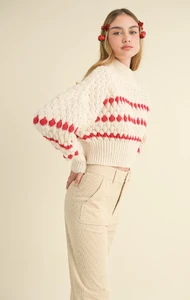 shop-at-grace-classicacres-sweater-cream-red-side_1300x2043.thumb.webp.de2a93d8d433a969602f63502a0e3a82.webp